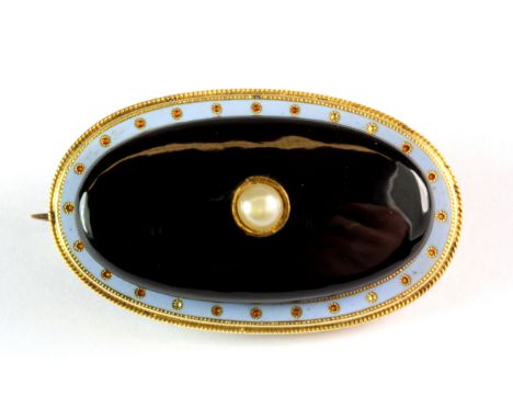 An interesting 9ct yellow gold (stamped 9ct) and enamel onyx and seed pearl set brooch, L. 3.5cm.