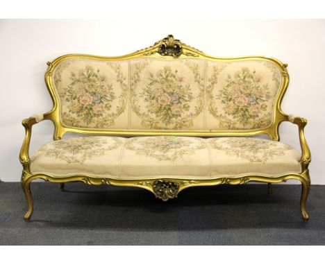 A French Rococo style tapestry upholstered gilt wood settee, W. 170cm.