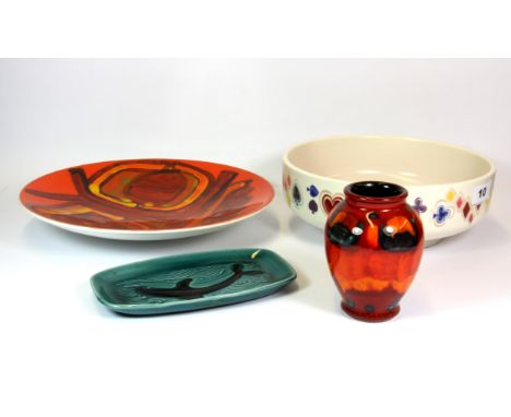 Four good pieces of Poole pottery including a bowl designed by John Waddington painted with playing cards suits, bowl dia. 23