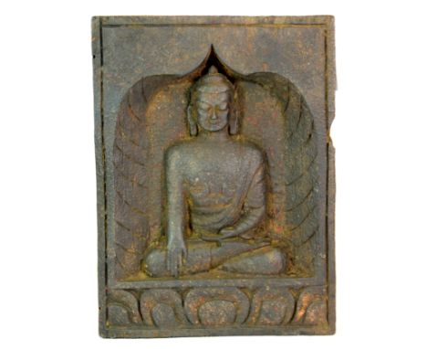 A 19th/early 20th century Sino-Tibetan carved wooden panel of a seated Buddha, 21 x 28 x 5cm.