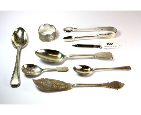 A hallmarked silver caddy spoon, napkin ring, silver propelling pencil, sugar tongs and other silver items.