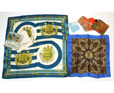 A vintage Hermes scarf, a Ferragamo scarf and others.