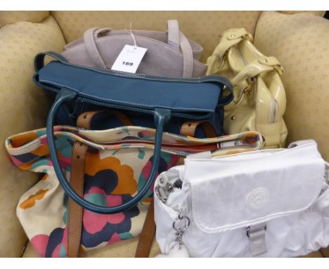 A collection of ladies handbags including 'Radley' 'Kipling' 'Fossil' & 'Artigiano' (5).