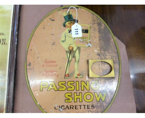 An enamel sign for Passing Show Cigarettes.