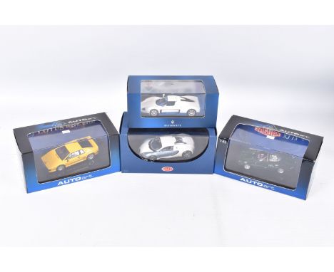 FOUR BOXED DIECAST MODEL VEHICLES, the first is a Maserati MC12 numbered MOC041, Maserati sticker reads AA7620BI in white wit