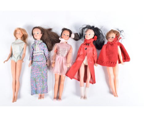 A VINTAGE 1960'S MATTEL TWIST AND TURN BARBIE DOLL, painted lashes, straight arms and legs, twist and turn waist, stamped ©19