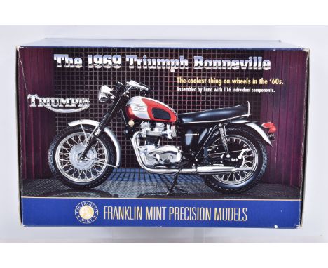 A BOXED FRANKLIN MINT 1969 TRIUMPH BONNEVILLE MOTORBIKE MODEL, 1/10 scale, appears complete and in very good condition, looks