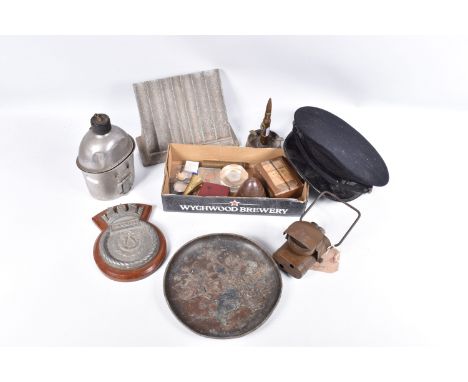 AN ASSORTMNET OF VARIOUS MILITARY RELATED ITEMS, this lot includes a trench art lighter, another small trench art piece, a n 