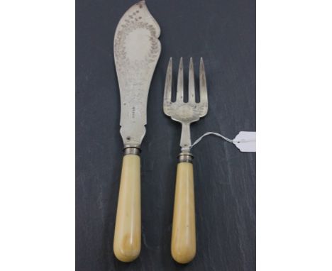 Victorian Fish Serving Knife and Fork Set, the silver blades with foliate engraving and silver collars and ivory handles, She