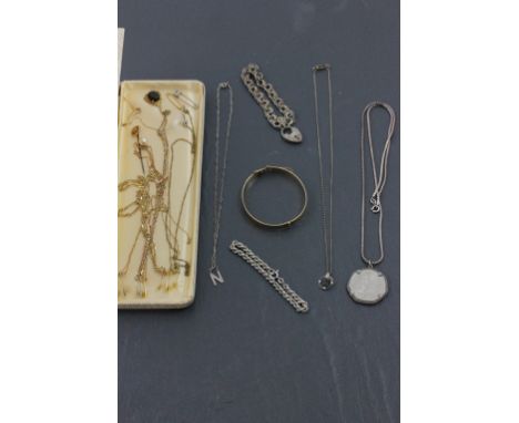 Three 9ct Gold Chains, Three Yellow Metal Chains, 15ct Gold Stick Pin, Two Pendants, Silver Bracelet, Rolled Gold Bangle, Sil