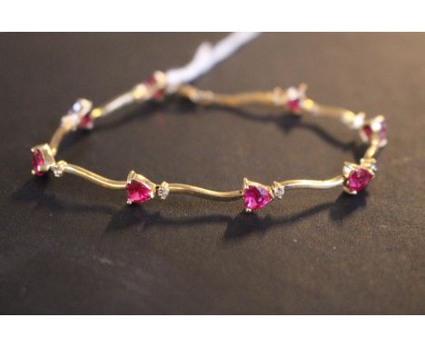 Ladies 10K Gold Ruby and Eight Cut Diamond Bracelet 5.7g total weight 