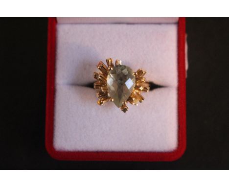 Interesting Ladies 14ct Gold Pear Shaped Prasiolite set ring with Explosion design. 9.2g total weight. Size M 