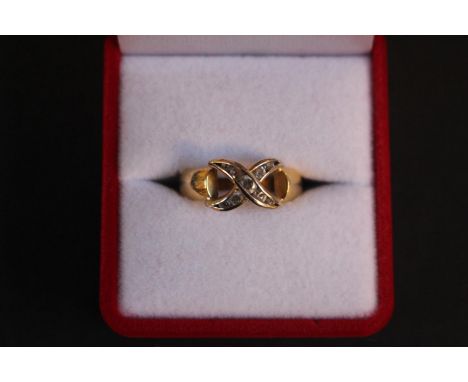 Ladies Yellow Gold Cross over design ring set with 9 stones 4.8g total weight Size O 