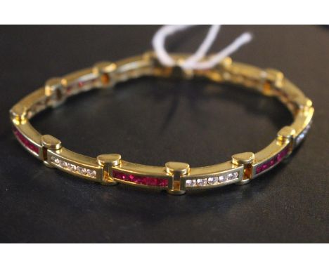 A Fine 18ct Gold  Ladies Ruby &amp; Diamond channel set Bracelet with 12 bars of alternating Ruby (3ct estimated total) &amp;