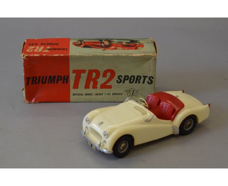 Victory Models. 1/18th scale Triumph TR2 sports car. Overall G. One windshield detached, but present. In F box.