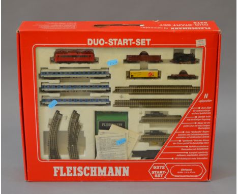 N Gauge. Fleischmann Duo train set. Contains DB pantograph electric locomotive, DB 0-6-0 steam locomotive, coaches, freight s