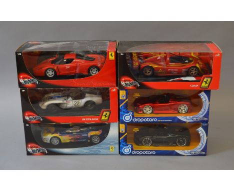 Six Hot Wheels 1:18 scale diecast Ferrari models: 29619; 56293; 29750; 29755; G7136; H3033. G-VG in dusty boxes. (6)