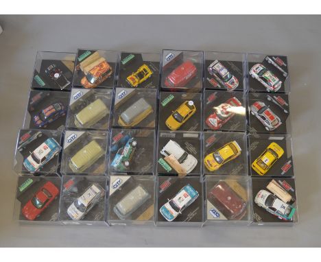 24 x Vitesse 1:43 scale diecast models, includes City and Skid models. G-VG, some models not screwed into bases, boxed.