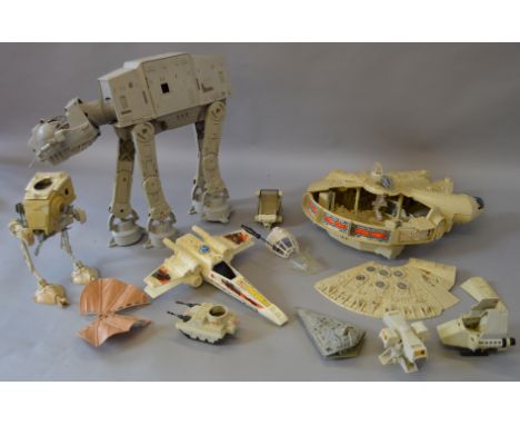 Quantity of Kenner Star Wars toys: AT-AT; Millennium Falcon; AT-ST; Ewok Glider; four mini-rigs; diecast Star Destroyer. 