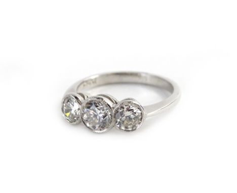 A three stone diamond ring, approx 1.4cts, set in 18ct gold, ring size N.