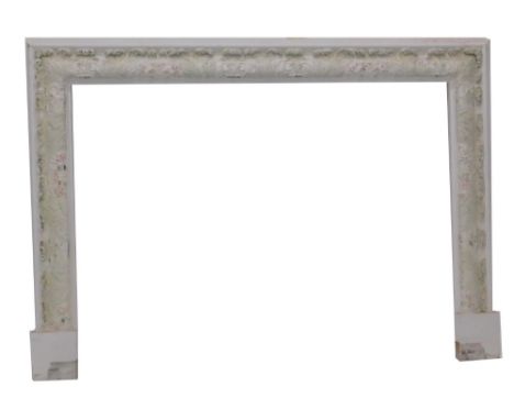 A white painted gesso fire surround, the leaf and flower frieze picked out in pastel colours, 151cm W.