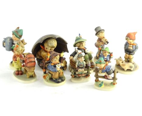 Various Goebel Hummel figures, to include boy on fence, 12cm H, boy picking flowers, others playing musical instruments, hold
