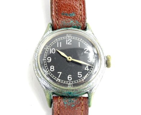 A 1940s/50s gents wristwatch, with a black enamel dial and cream coloured handles, in a stainless steel back on brown leather