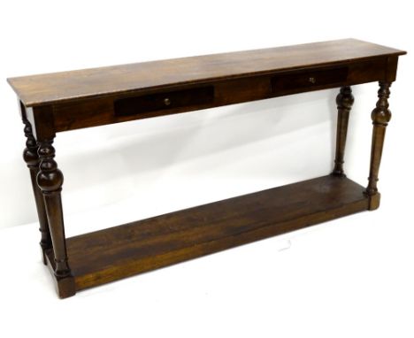 A hardwood hall or console table, the narrow rectangular top with two frieze drawers on turned legs with pot board base, 173c