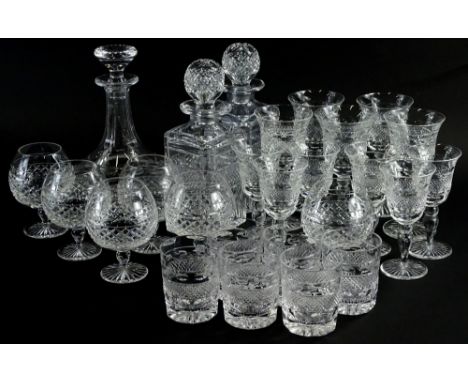 A suite of cut glass, to include a ship's type decanter and stopper, various brandy, wine and whisky glasses, and a pair of s