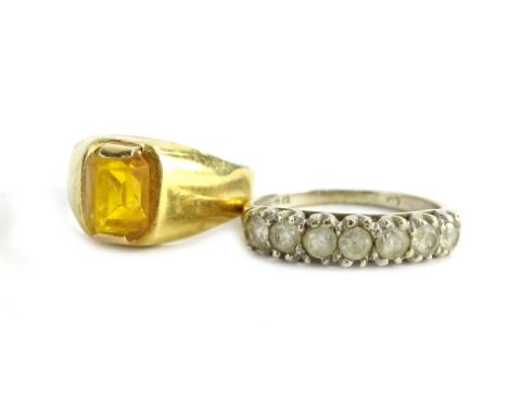 Two 18ct gold rings, one set with rectangular cut citrine in yellow 18ct gold, ring size M½, the other a cz set half hoop ete