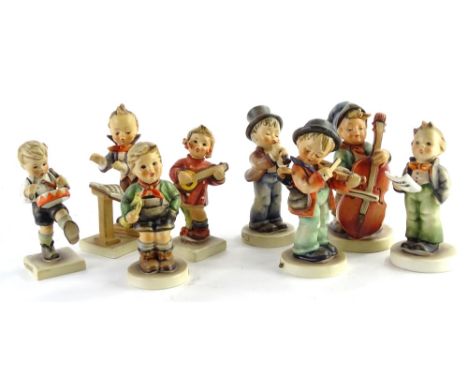 Various Goebel Hummel figures, to include a boy with drum, 13cm H, Happiness, etc., printed marks beneath. (8)