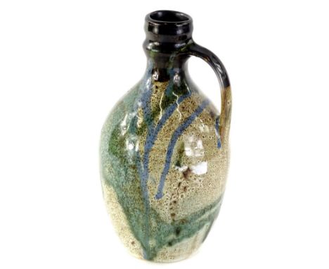 A John Bedding studio pottery vase, with drip decoration in blue, brown and green, raised marks to underside, 26cm H. John Be