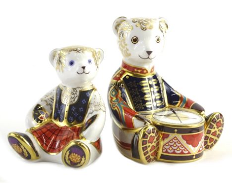 Two Royal Crown Derby porcelain teddybear paperweights, one drumming, the other female figure seated titled Scottish Teddy Sh