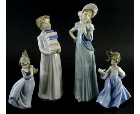 Four Nao porcelain figurines, to include a boy carrying books and two young girls.