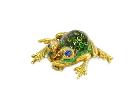 An 18ct gold enamel frog brooch, with two cabochon sapphire eyes, on a green and brown enamel body, hallmarked to the rear fo