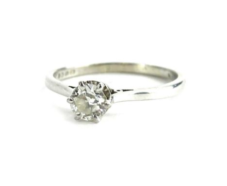 An 18ct white gold diamond solitaire ring, with round brilliant cut diamond in six claw setting, measuring 4.8mm x 3.2mm, app