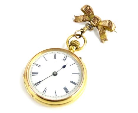 An 18ct gold fob watch, the back engraved with monogram and mounted with a bow shaped brooch adaption, the watch 39.7g all in