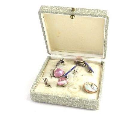 A part gentleman's collar stud set, comprising three pink stone set collar studs, an enamel horse stud, and three blue enamel