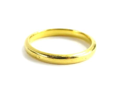 A 22ct gold wedding band, ring size L½, makers stamp WW Limited, 3g.