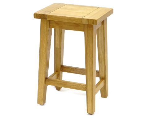 An ex shop display natural oak tall lamp table or stool, on square tapering legs, 40cm W.