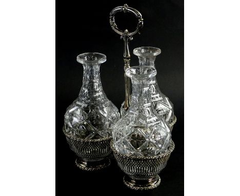 A silver plated decanter stand and three cut glass decanters, no stoppers, 33cm H.