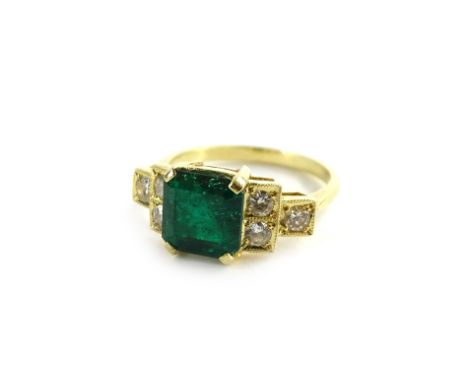 An Art Deco emerald and diamond ring, set in 18ct gold, ring size M.