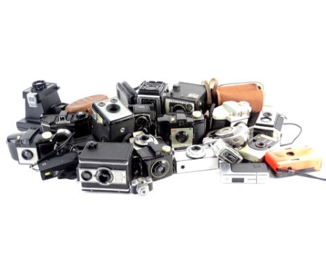 A large quantity of cameras, to include a Ful-Vue super, Polaroid Instant 10, Brownie Reflex, Kodak, and other plastic camera