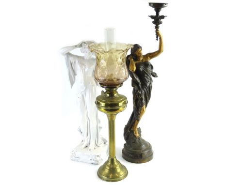 A French spelter table lamp, modelled in the form of a Neoclassical lady holding a torch, titled to base Lejour, 80cm H, an o