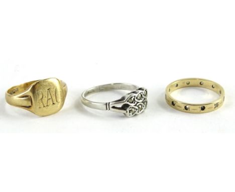 Miscellaneous rings, to include 9ct gold signet ring, initialled RAC, 4g, a silver and white stone ring, and an eternity ring