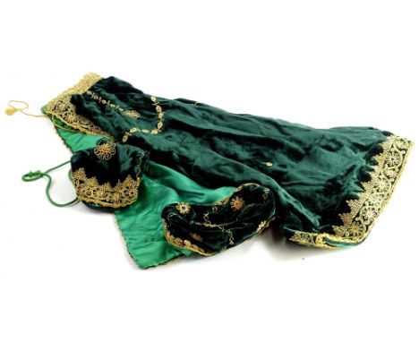 A velvet evening cap and matching cape, etc., with floral decoration and surround, in green and gilt colours, size unknown.