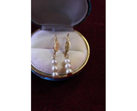 A pair of 18ct gold and seed pearl drop earrings 