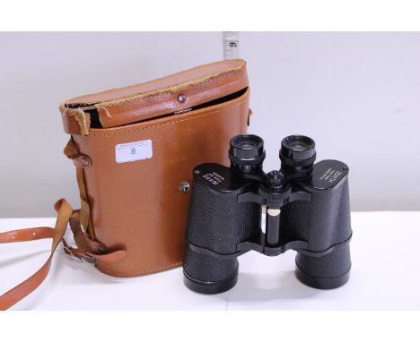 A pair of cased Zenith 10 x 50 field binoculars 