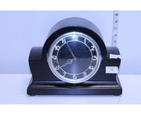 An Art Deco period wooden cased mantle clock 
