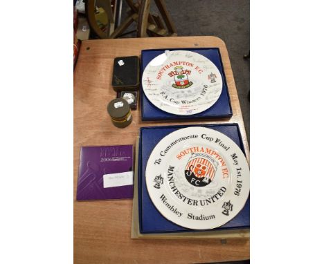 A mixed selection of police buttons, enamel pin badges, a cased Royal Mint crown and a Southhampton football plate